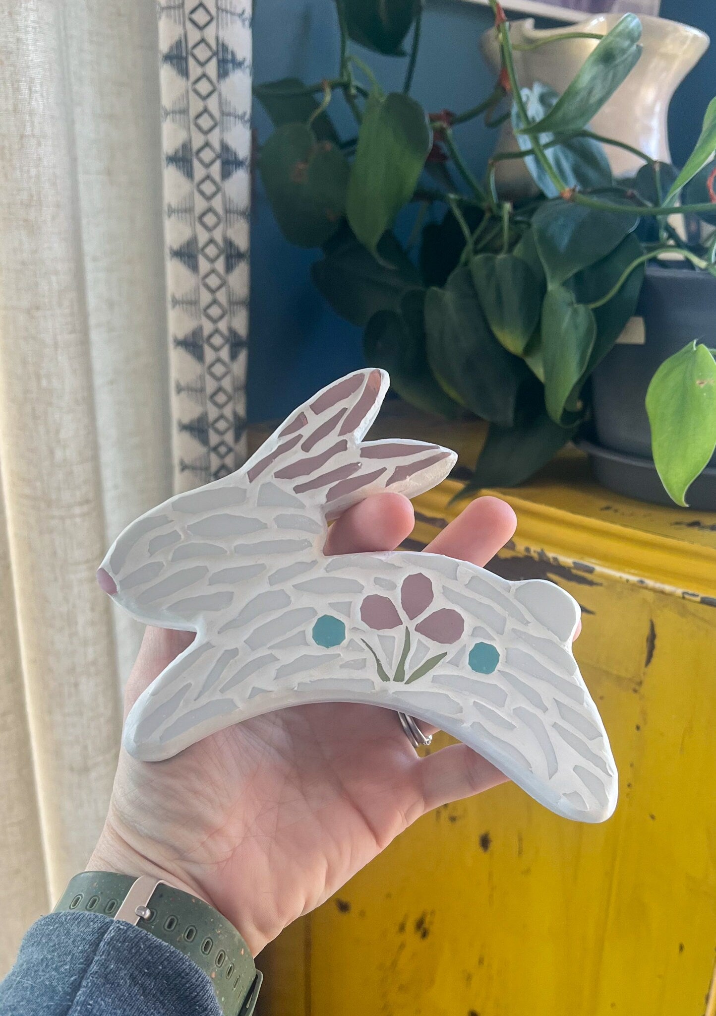 White rabbit mosaic wall hanging with pink folk art flowers