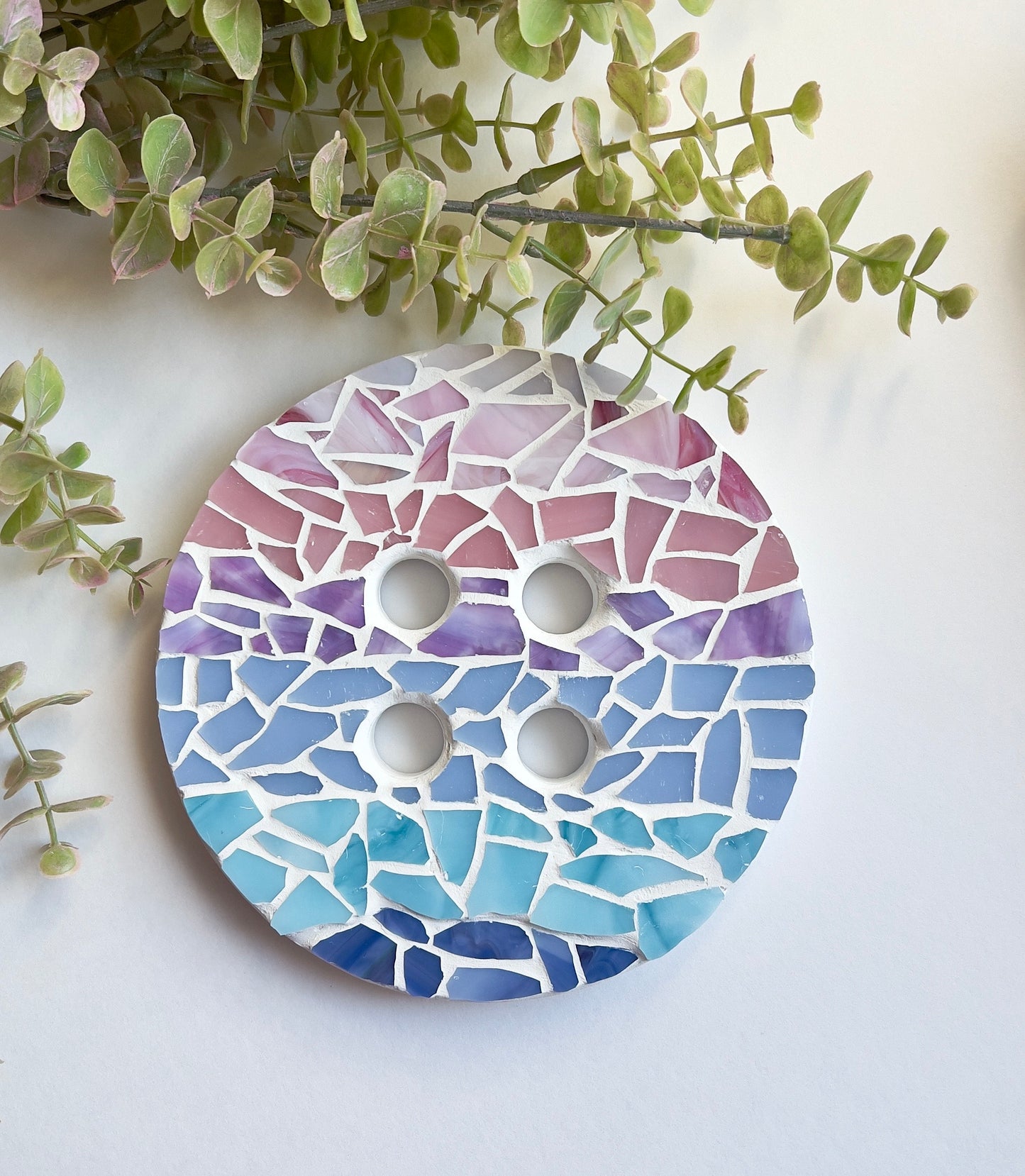 Stained glass mosaic button wall hanging in ombre pastel colors and white grout