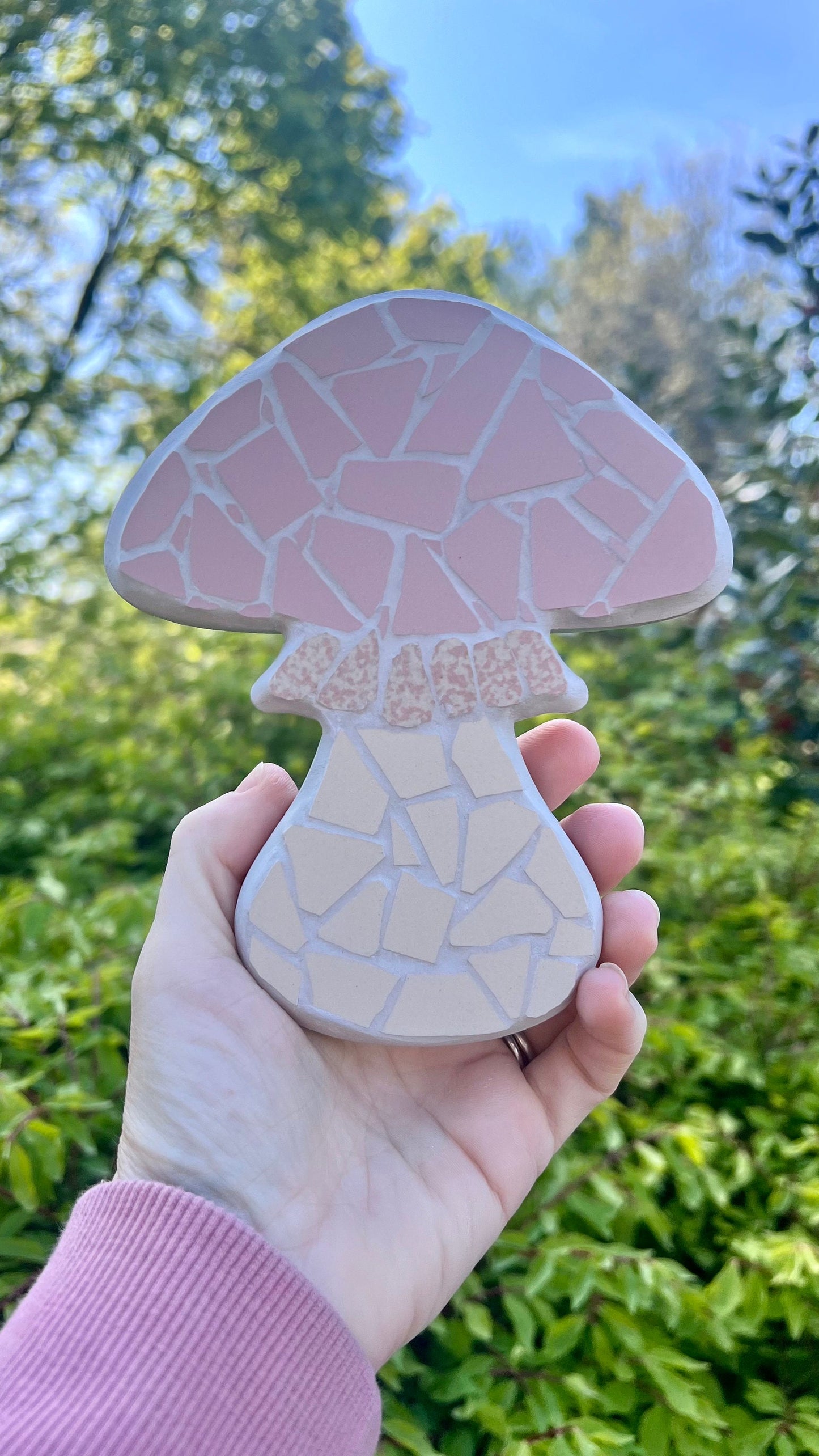 Pink mushroom mosaic wall art piece made out of ceramic tile