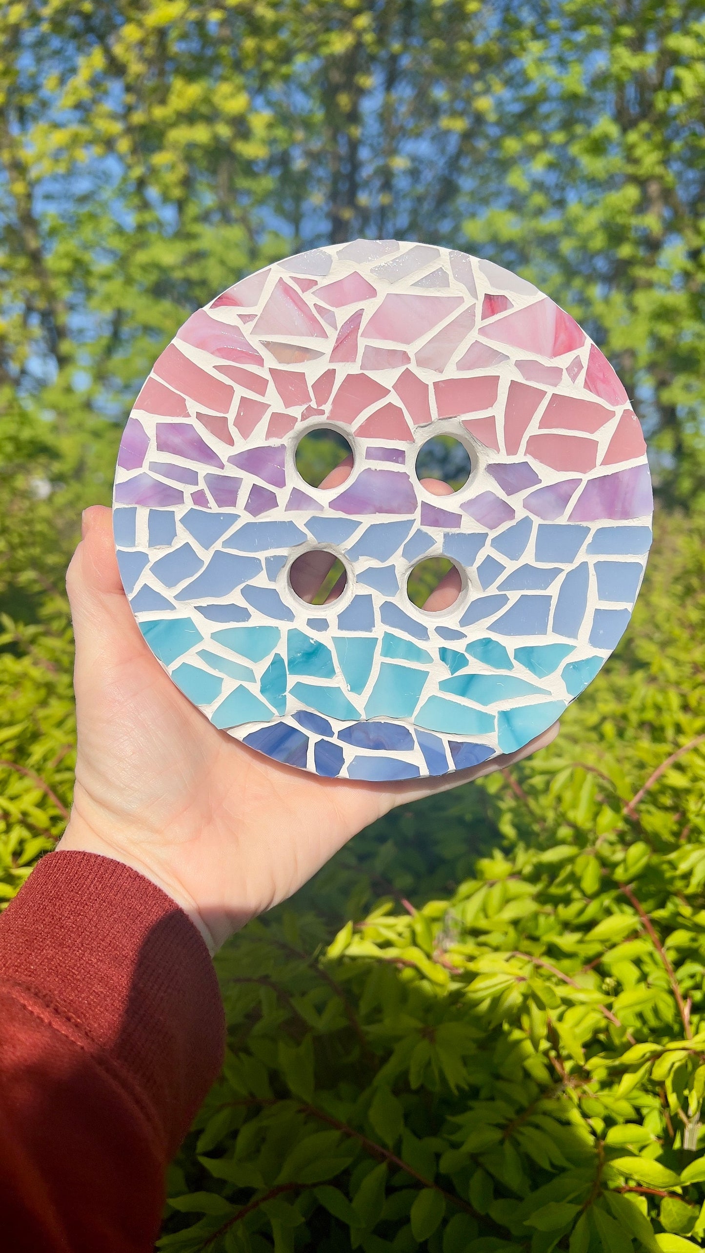 Stained glass mosaic button wall hanging in ombre pastel colors and white grout