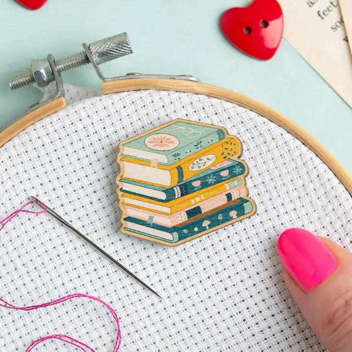 Wooden Needleminder in the shape of a stack of books