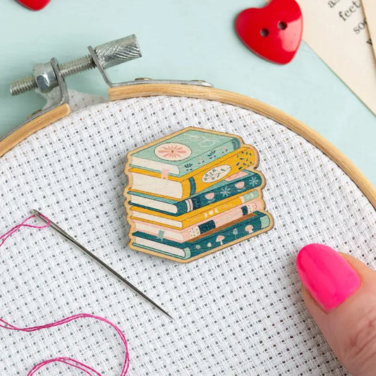 Wooden Needleminder in the shape of a stack of books
