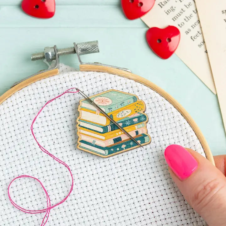 Wooden Needleminder in the shape of a stack of books