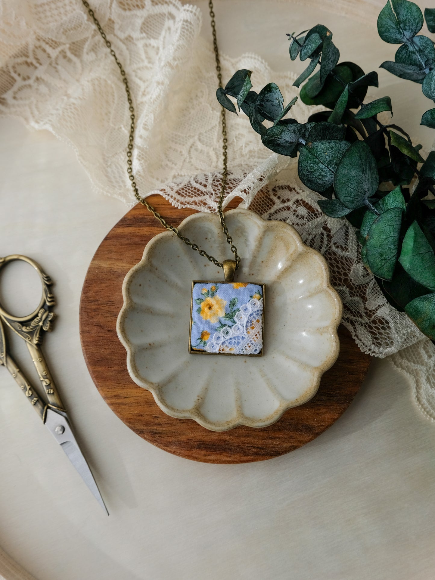 Fabric and Lace Pendant Necklace in Bronze