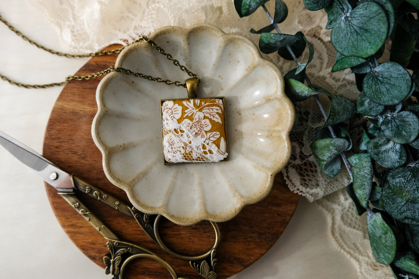 Fabric and Lace Pendant Necklace in Bronze