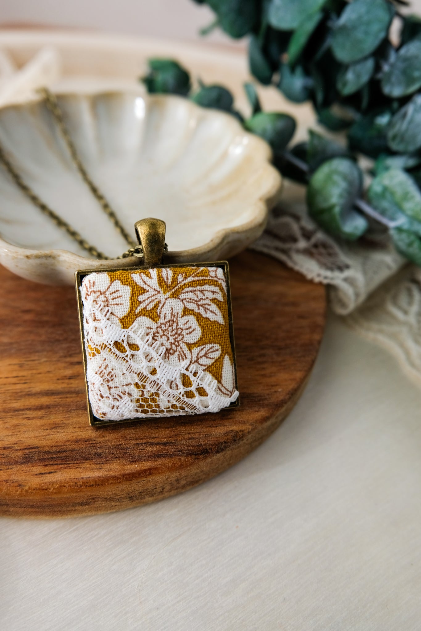 Fabric and Lace Pendant Necklace in Bronze