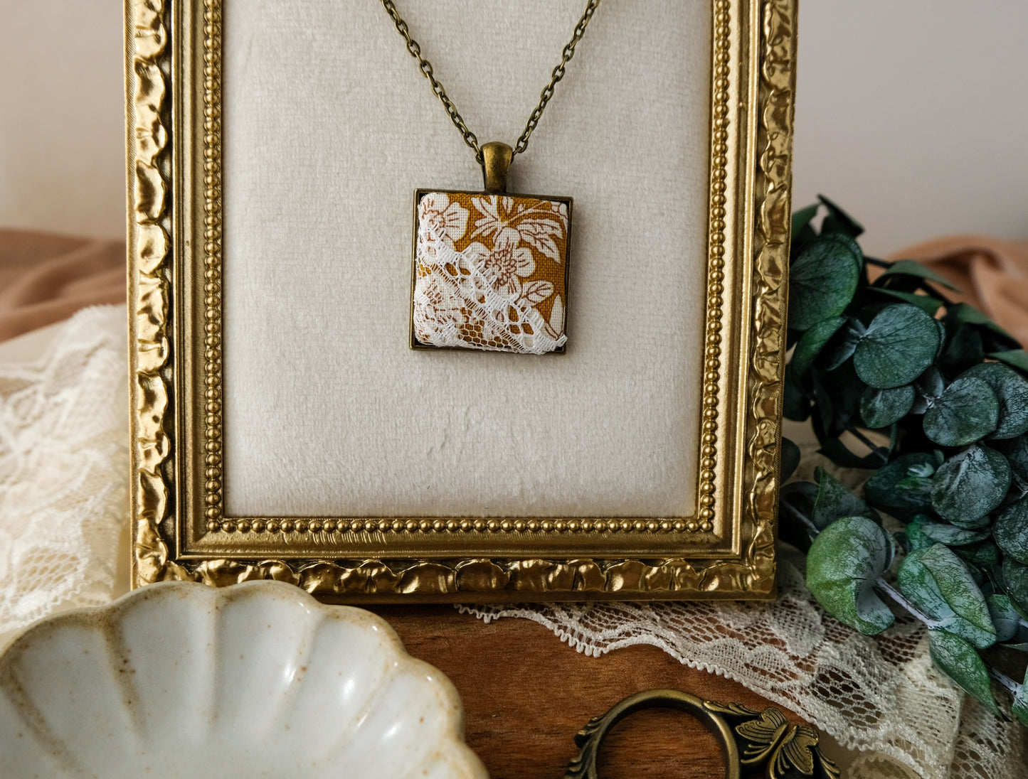 Fabric and Lace Pendant Necklace in Bronze