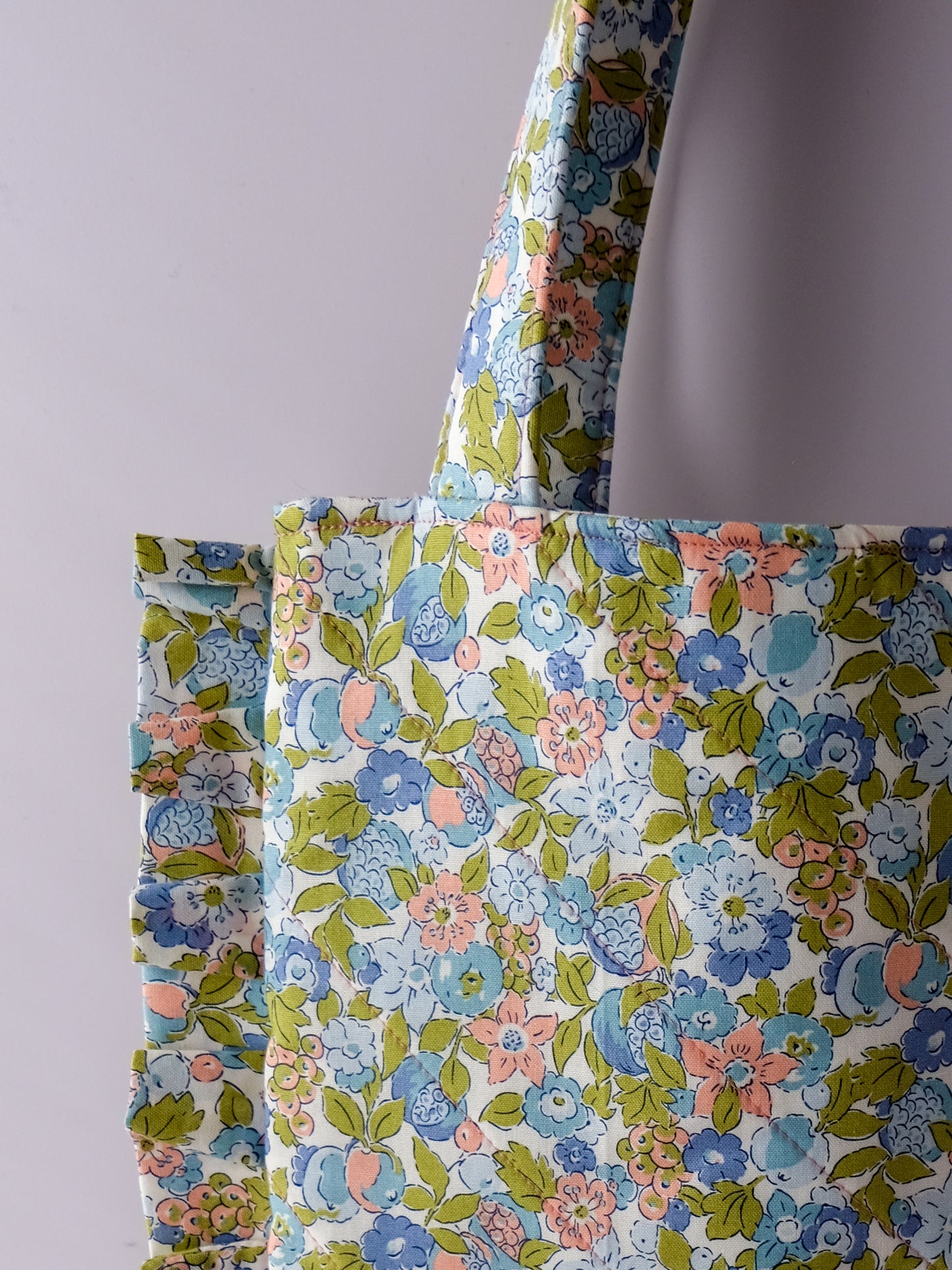 Quilted Floral Ruffle Tote Bag