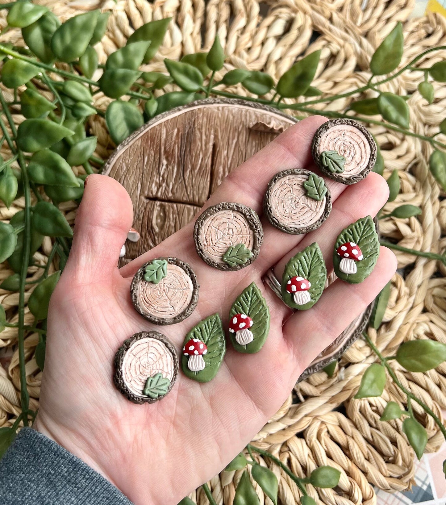 Polymer clay tic tac toe board with tree slice and mushroom pieces