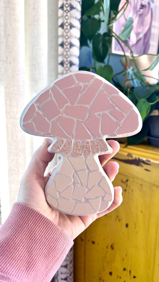 Pink mushroom mosaic wall art piece made out of ceramic tile