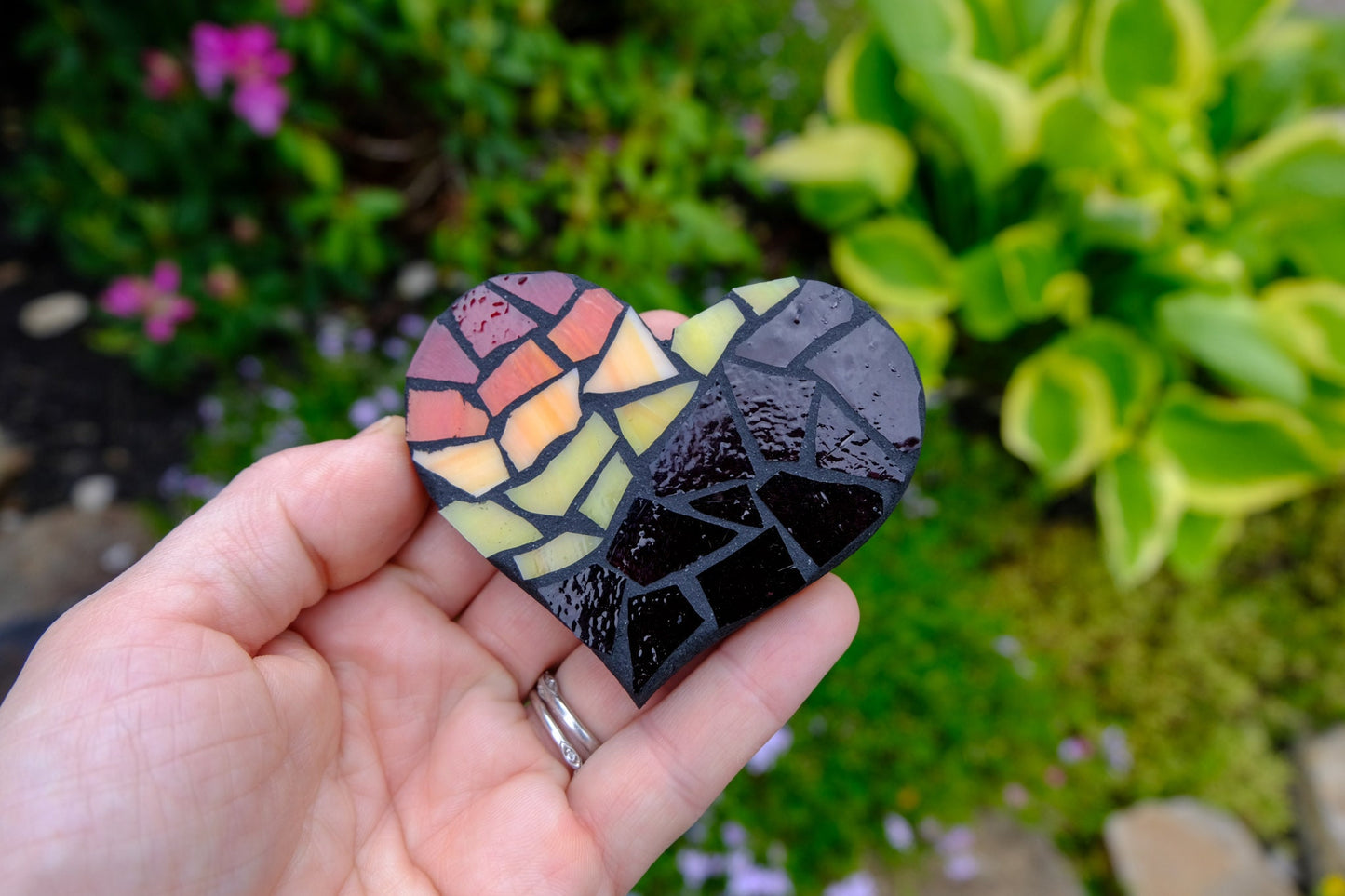 Retro colored striped heart stained glass mosaic magnet with black grout