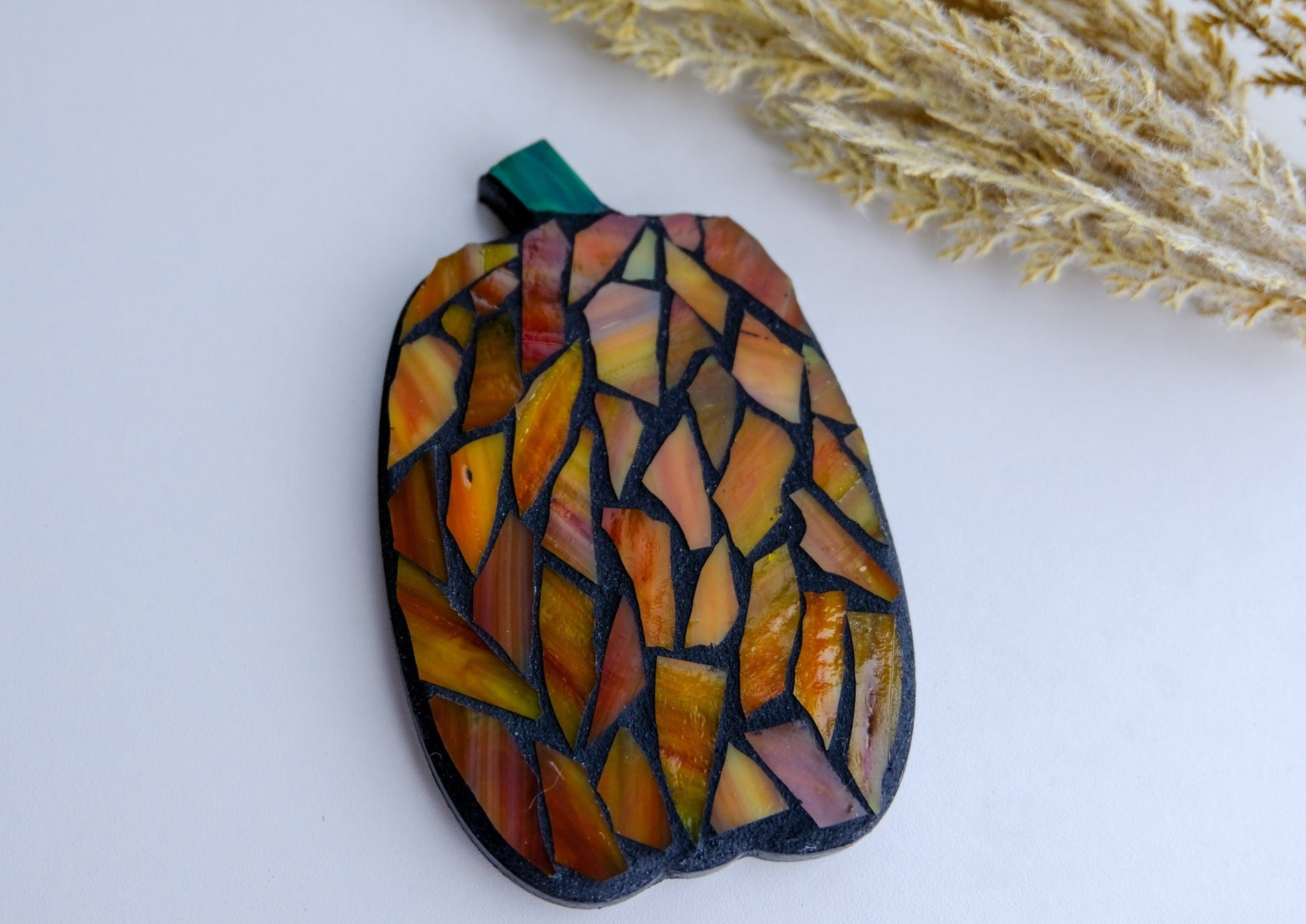 Stained glass mosaic pumpkin magnet with black grout