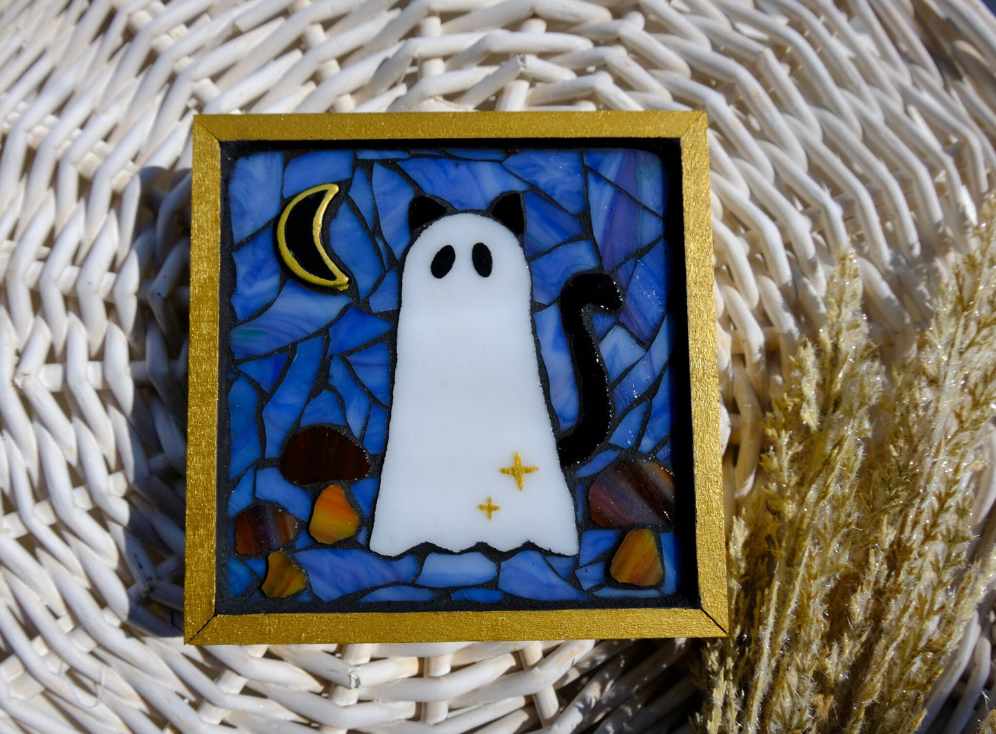 Stained glass mosaic ghost cat with mushrooms and a moon